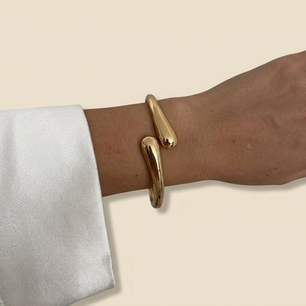 Sculptural Cuff Bangle - open wrap, gold color, worn