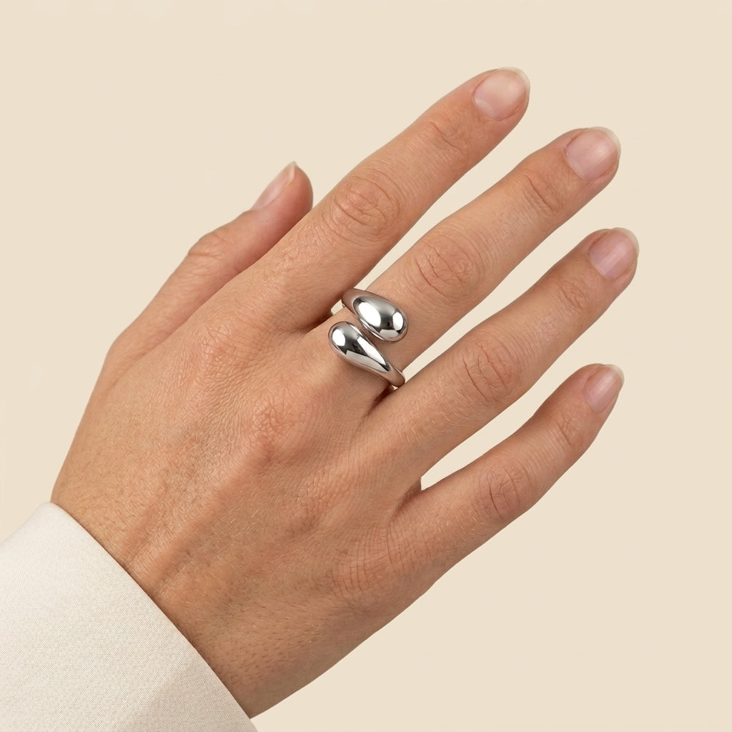 Cutout Statement Ring - double teardrop design, silver color, worn