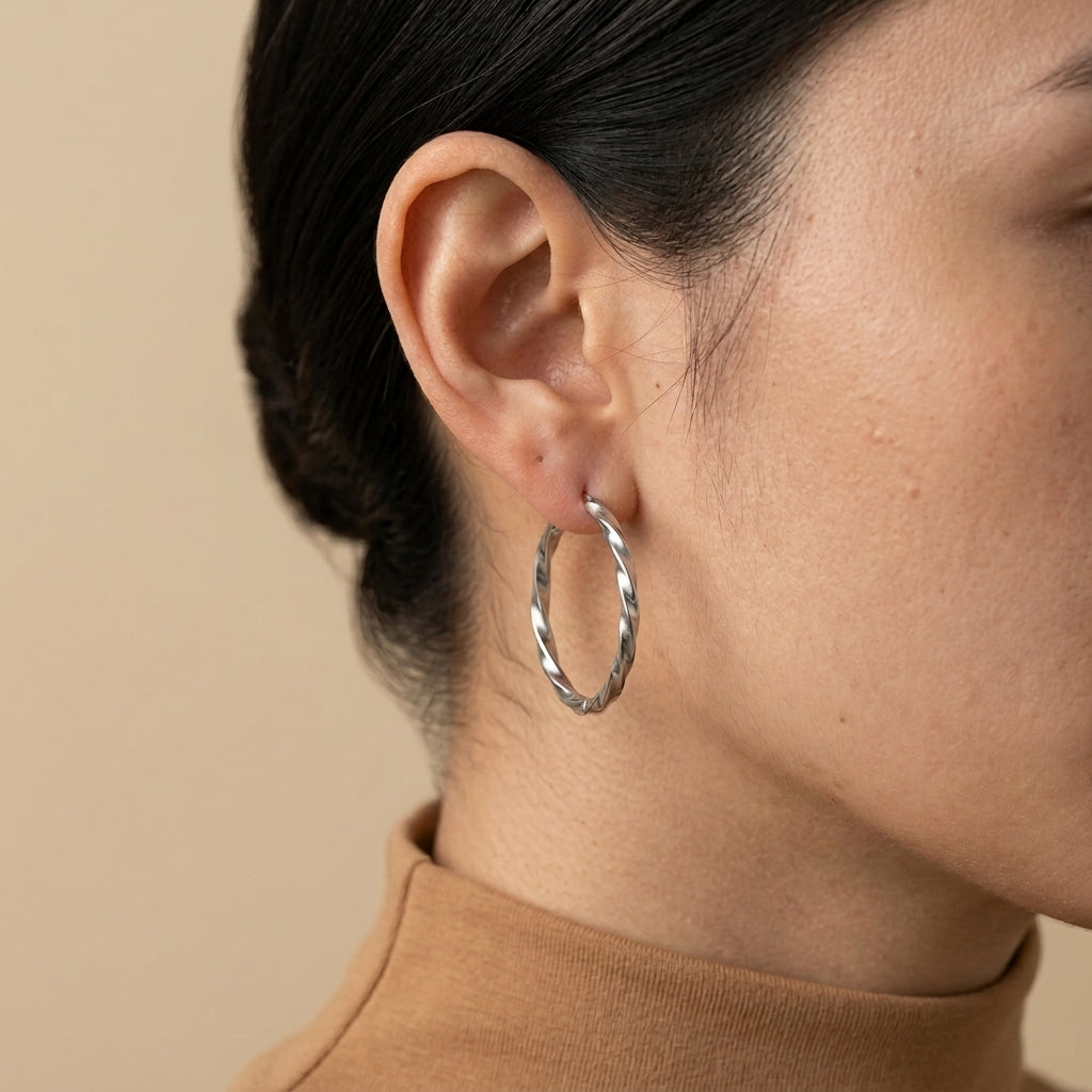 Geometric Pattern Hoops - silver color, worn