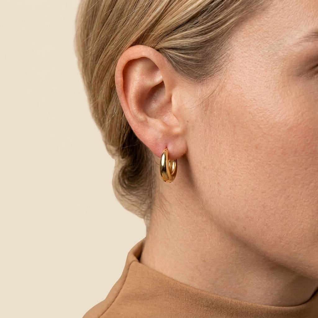 Minimalist Huggie Hoops - gold color, worn