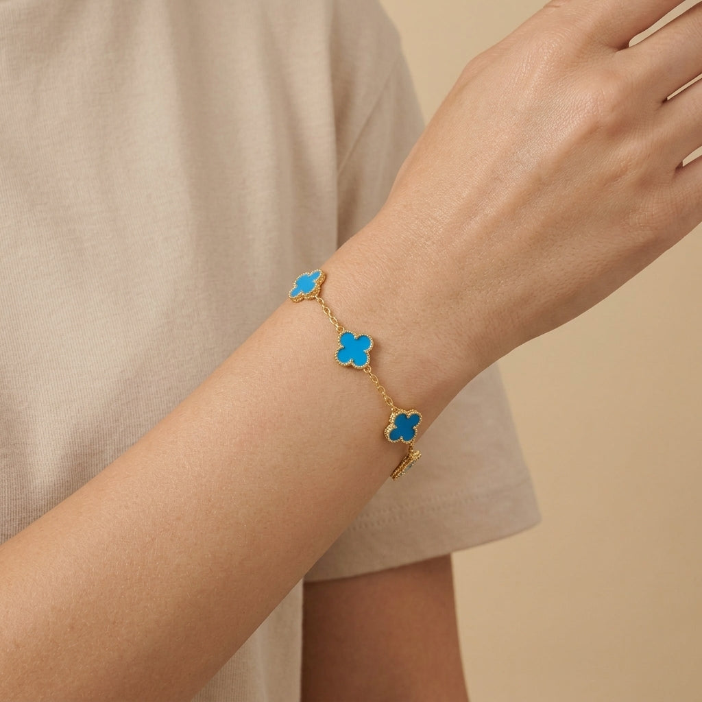 Four-Leaf Clover Bracelet - gold color, worn