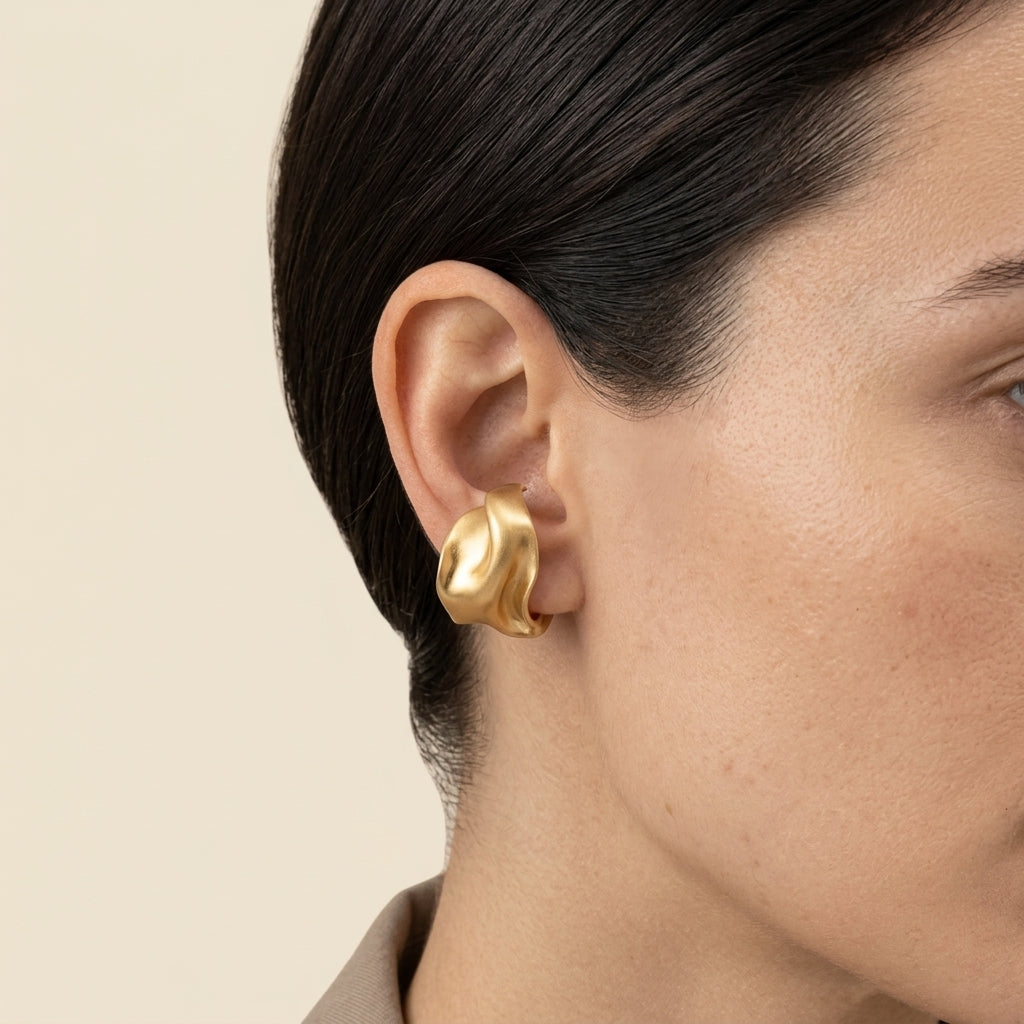 Sculptural Ear Cuff - gold color, worn