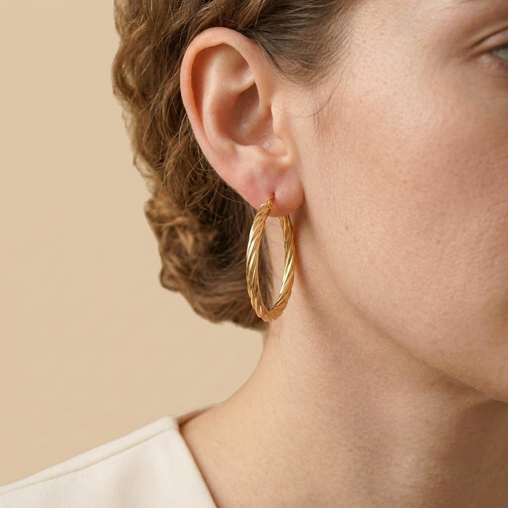 Twisted Round Hoops - gold color, worn